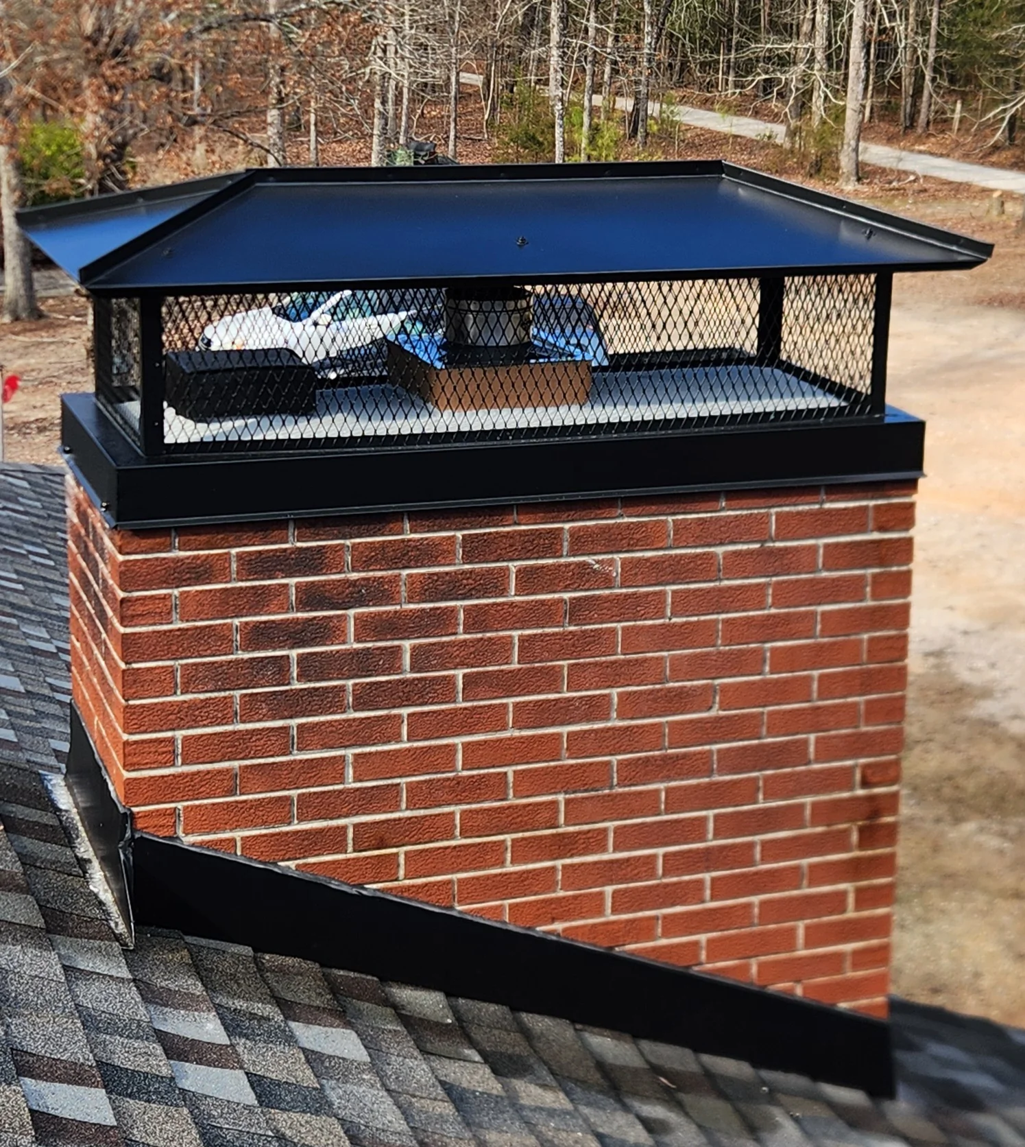 Custom chimney cap screen to block animals and debris