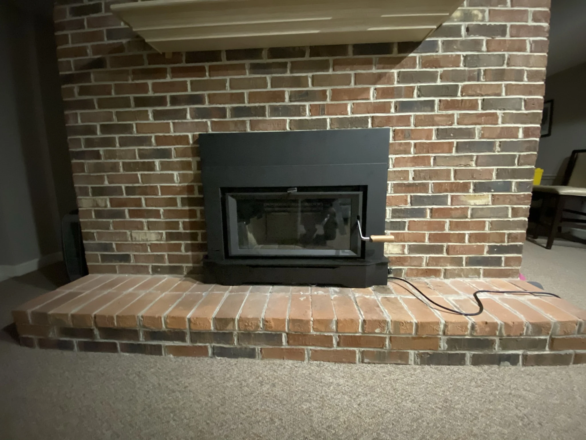 Before and after fireplace insert upgrade